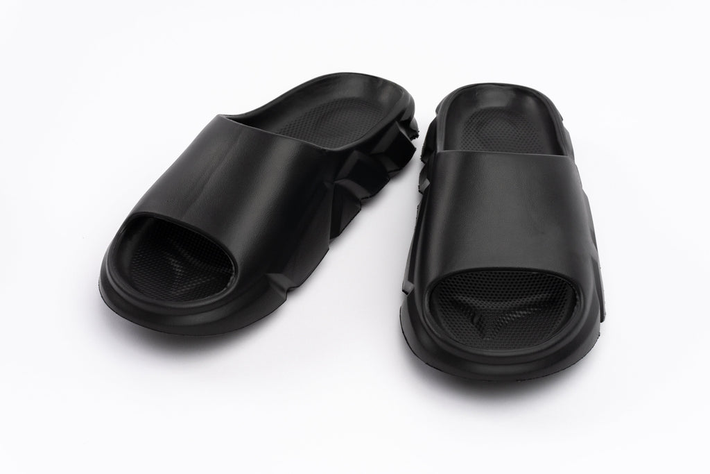 Pair of black slides on a white background