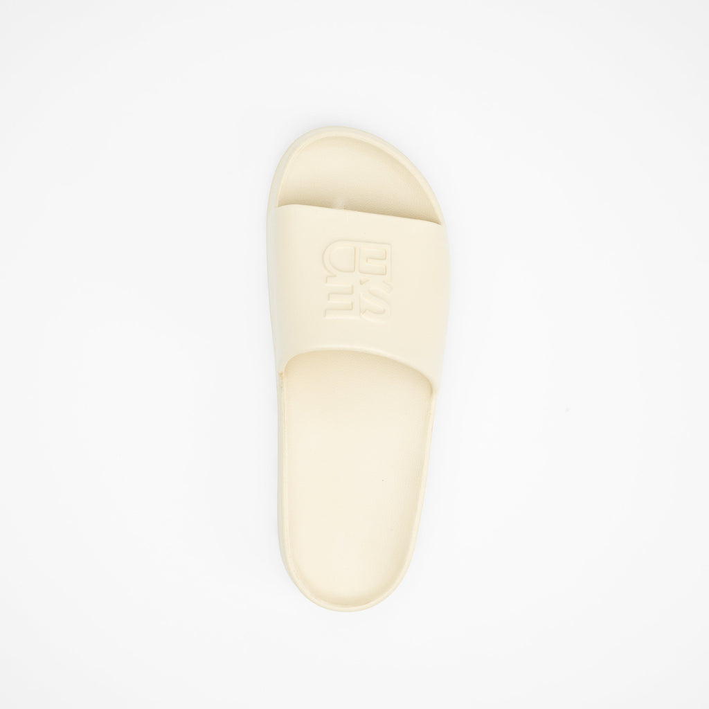 Beige sandal on a white background
