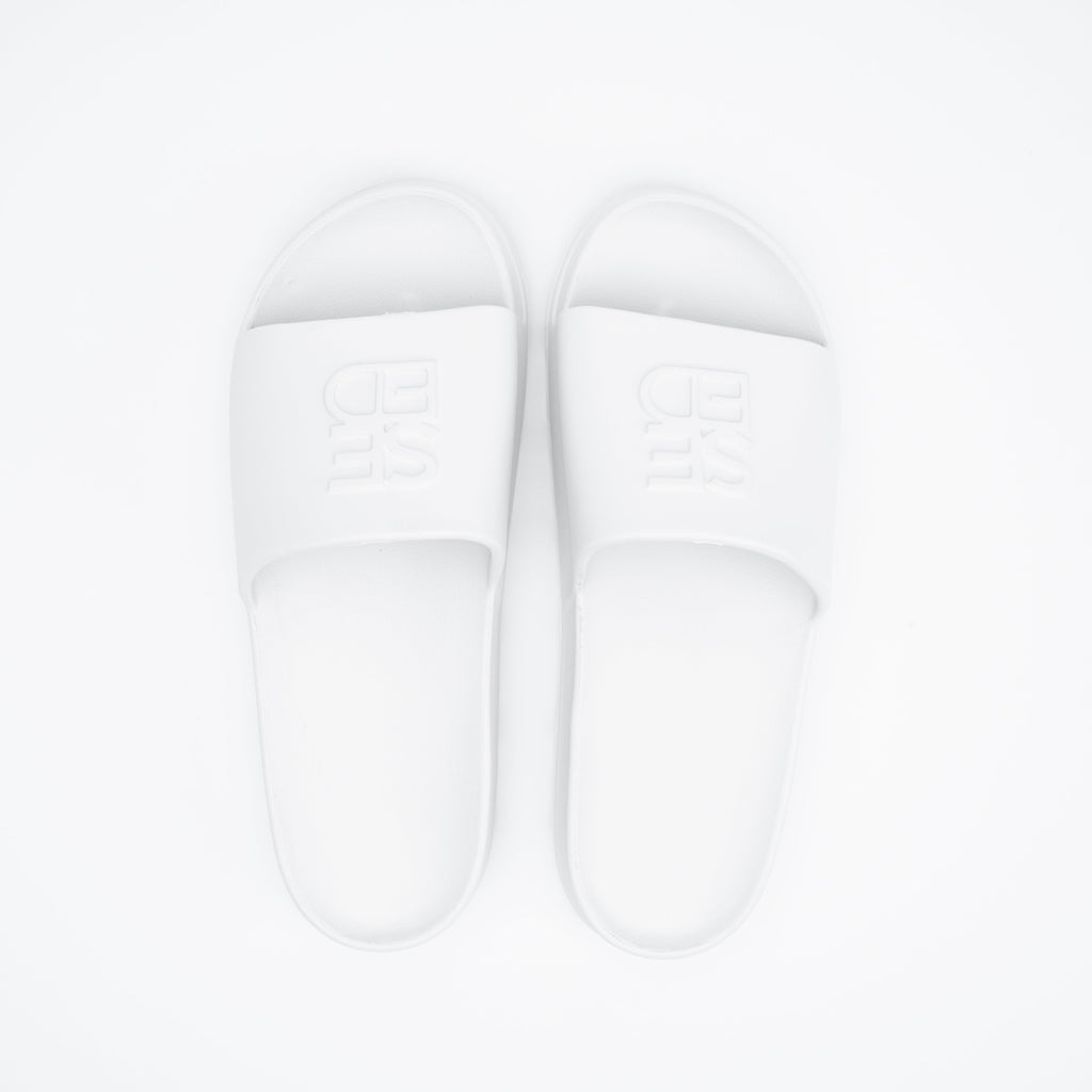 White abstract design on a light gray background