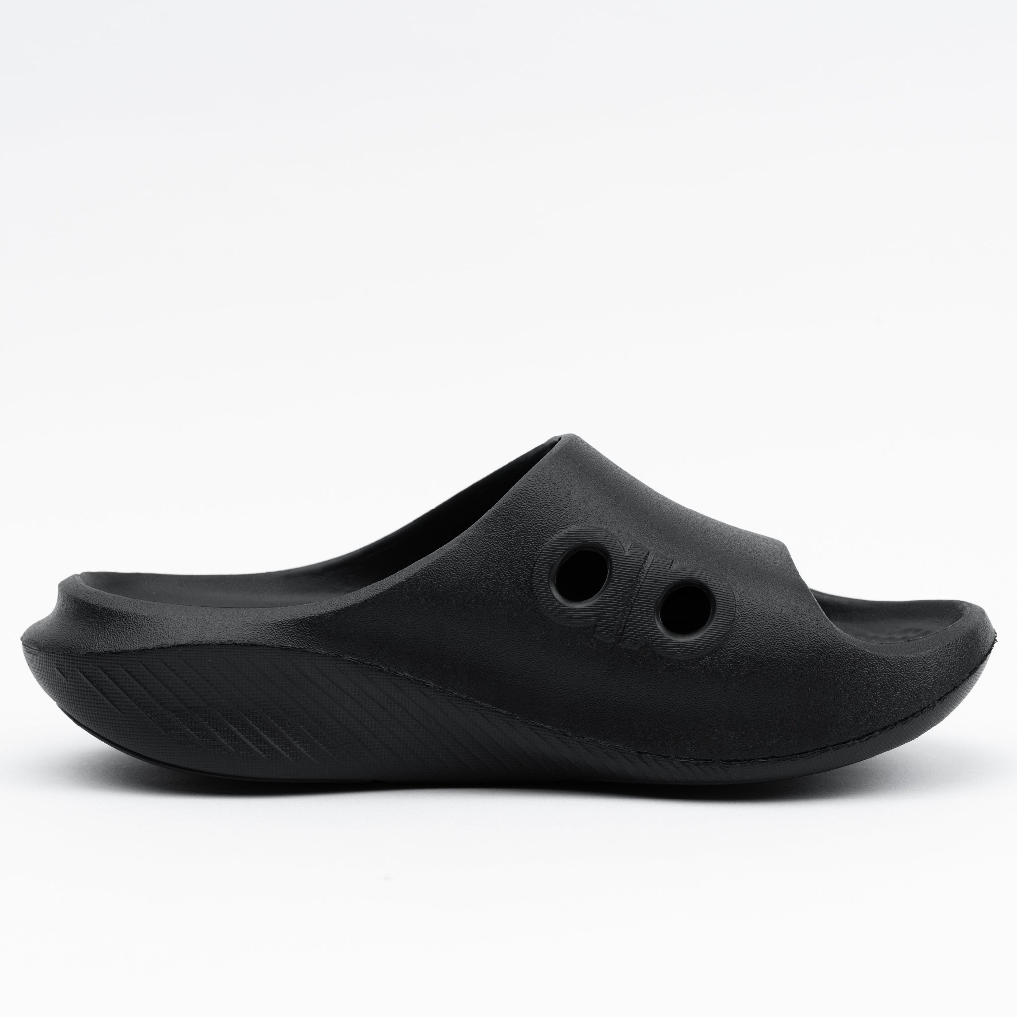 Black clog shoe on a white background