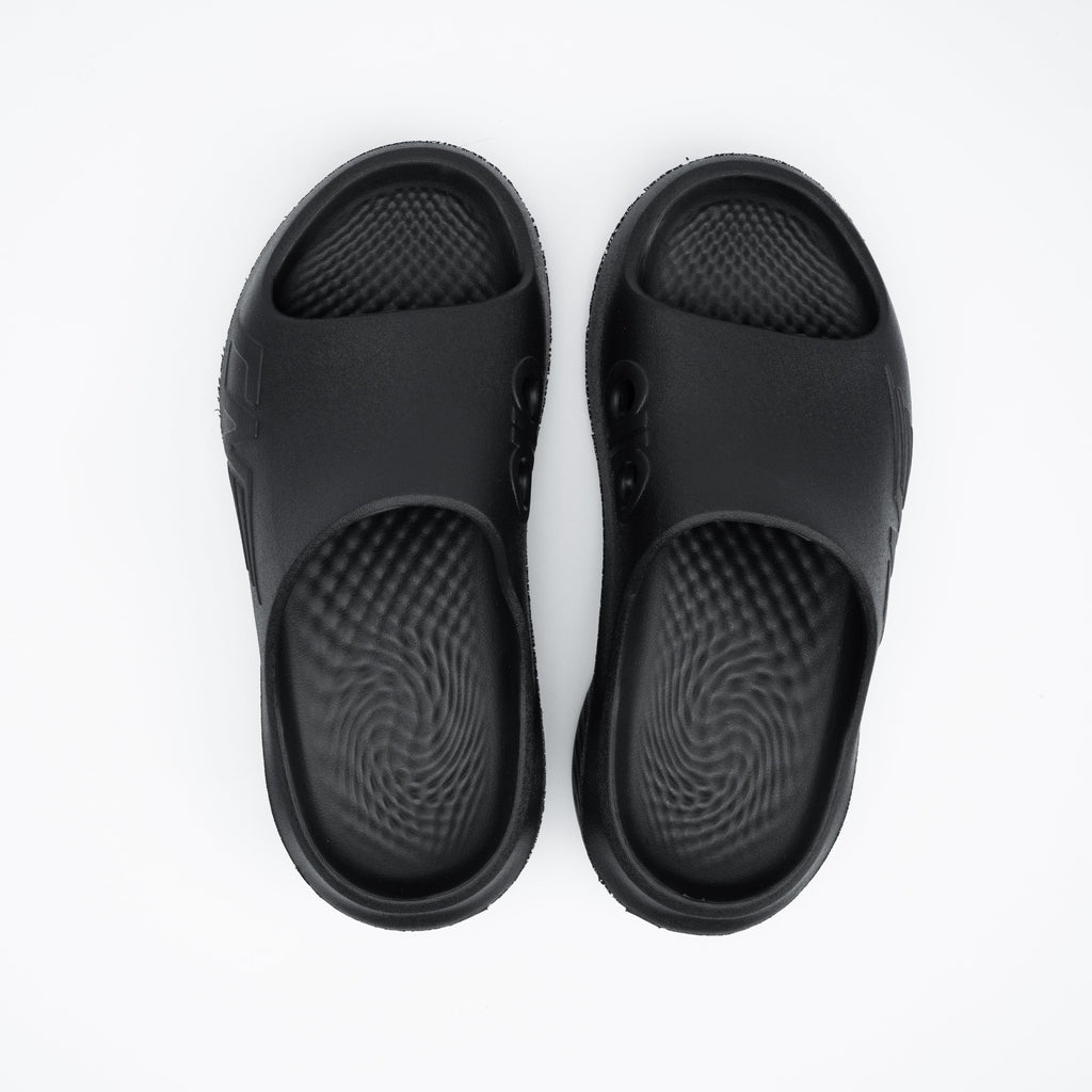 Pair of black sandals on a white background
