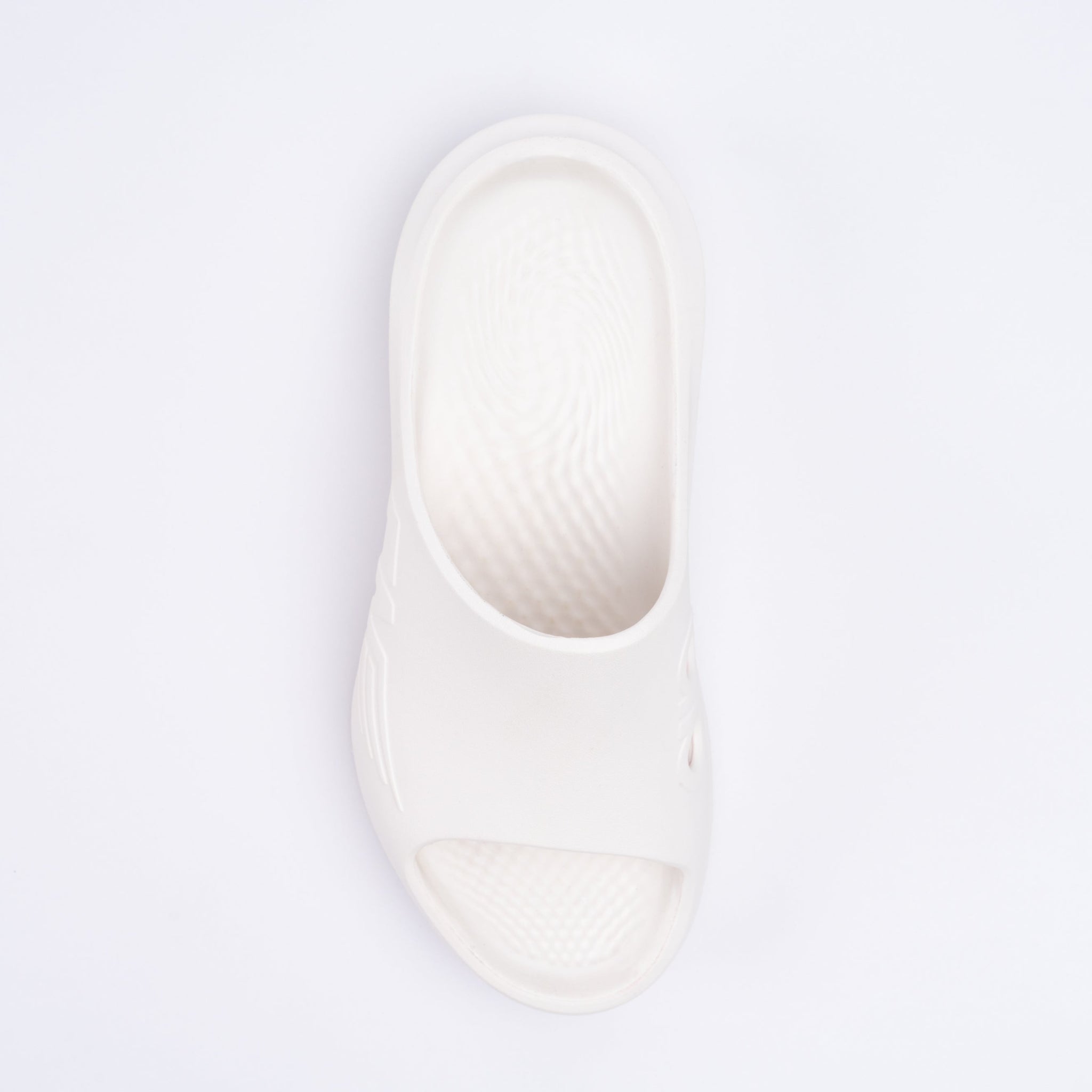 White sandal on a light gray background