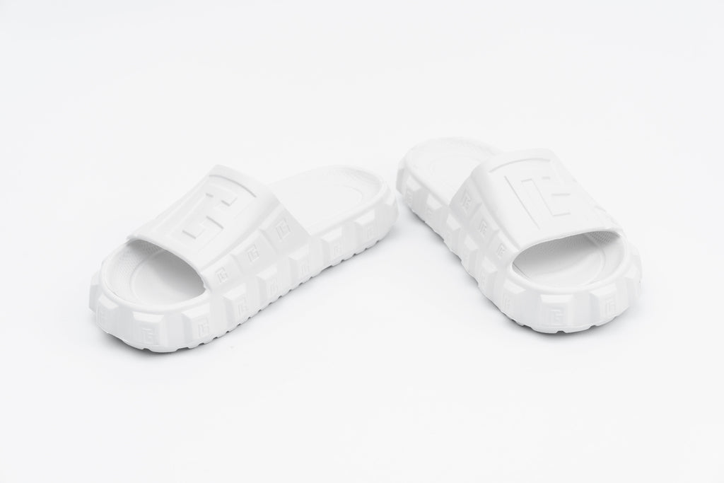 Pair of white slides on a light gray background