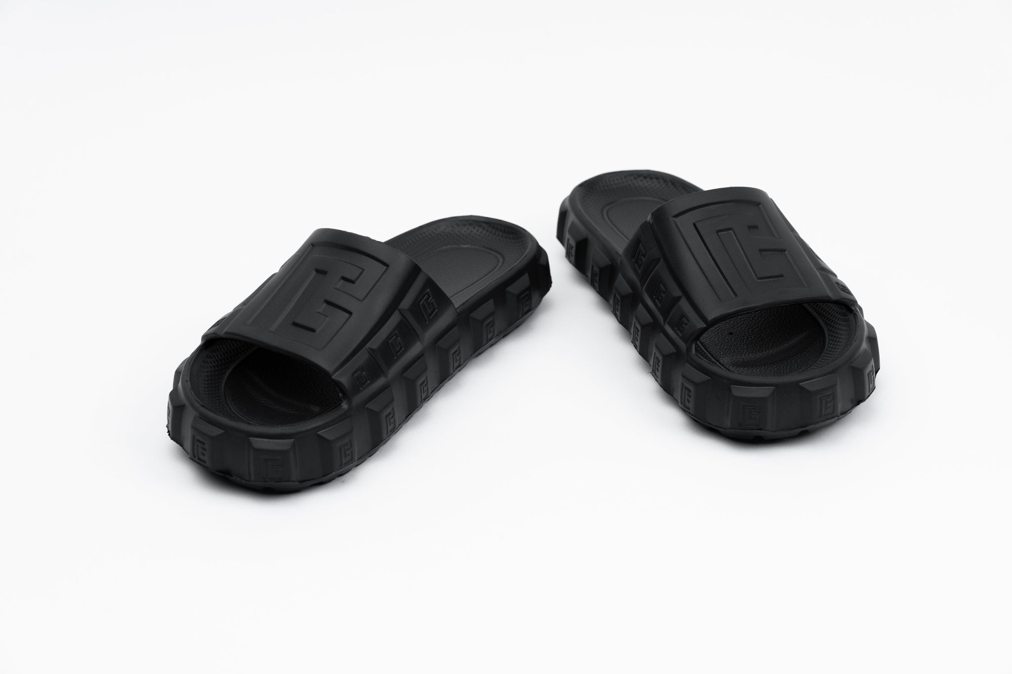 Pair of black slides on a white background