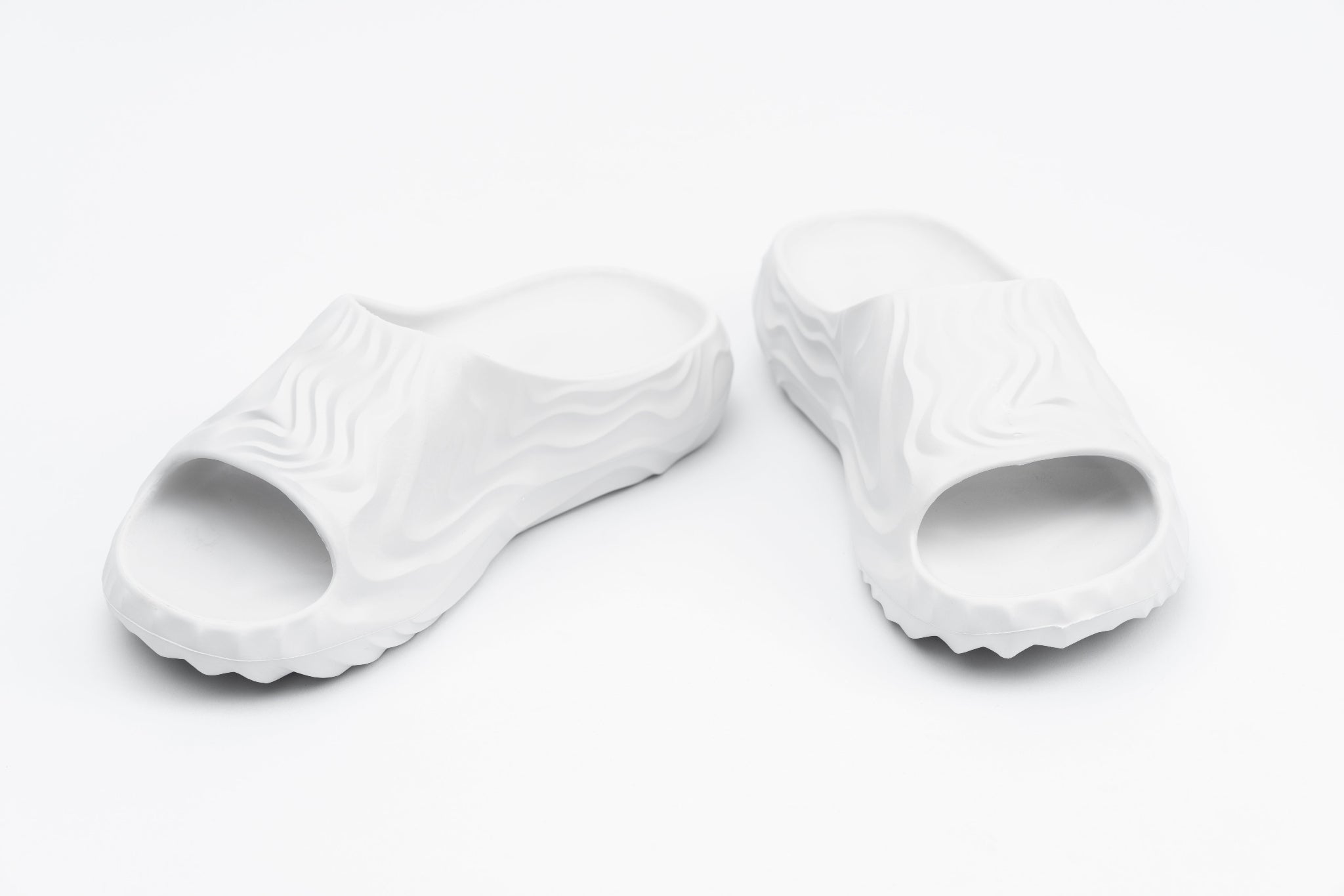 White slippers on a white background