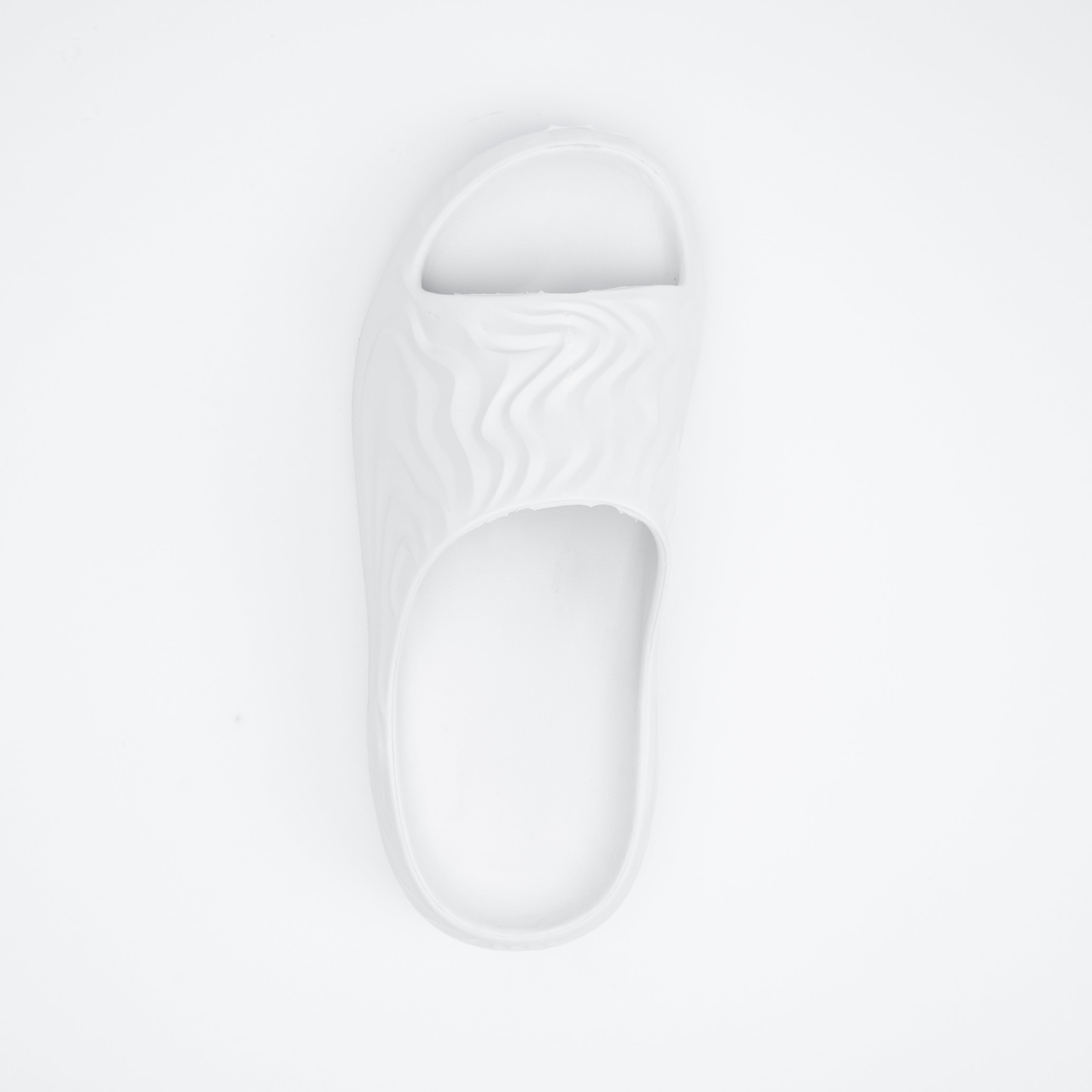 White sandal on a light gray background
